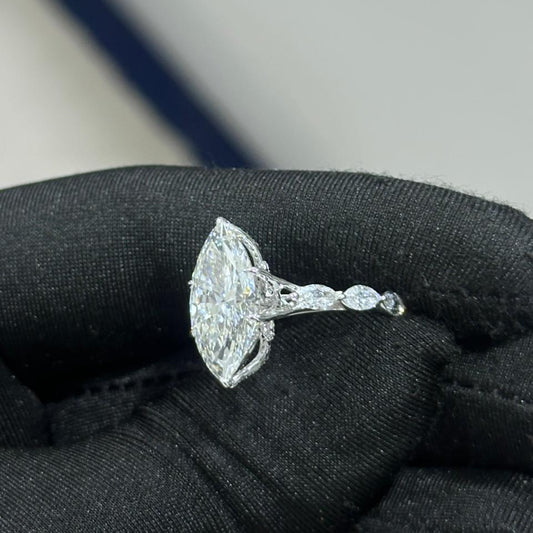 Marquise cut diamond engagement ring in 18k white gold with side stones, custom made in Dubai UAE by Lamae Jewelry